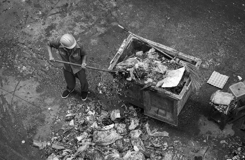 Construction site with waste removal in action