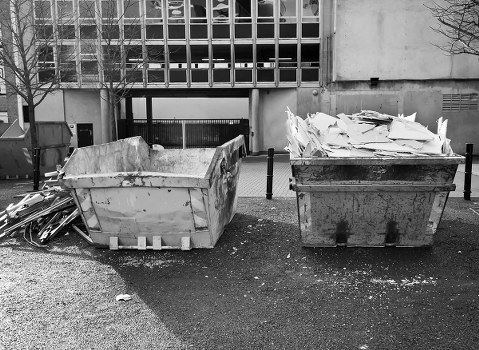 A large skip container placed outside a property in Brent Cross for waste removal